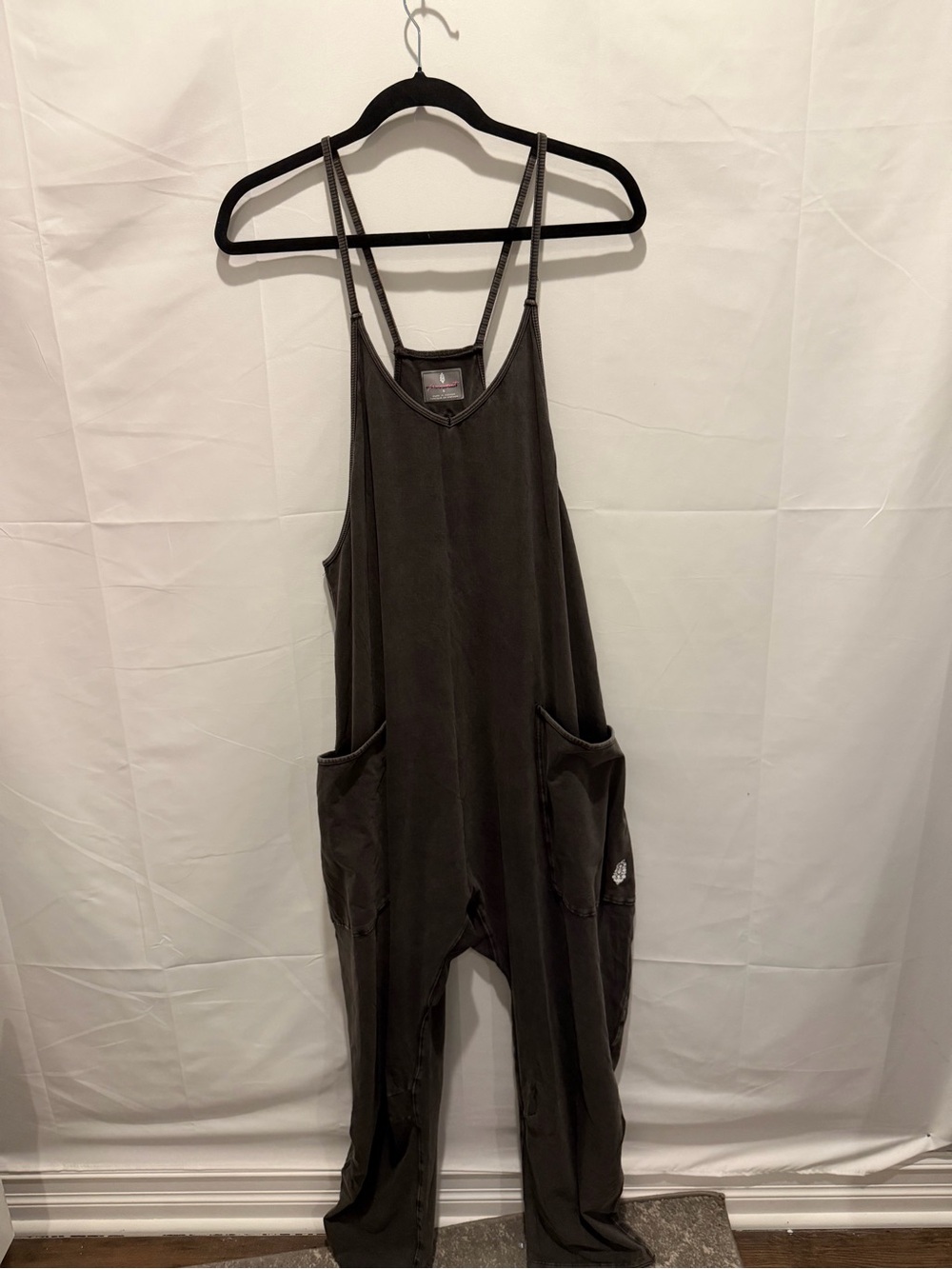 Free people black wash hot shot onesie size S.small imperfection on strap.summer